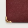 Internationale Geldbörse mit Seitenfalten, Must de Cartier – burgunderrotes Kalbsleder, goldfarbenes Finish – Cartier