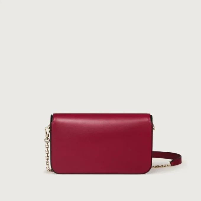 Mini-Kettenhandtasche, Double C de Cartier – Kirschrotes Kalbsleder, Gold und kirschrote Emaille – Cartier