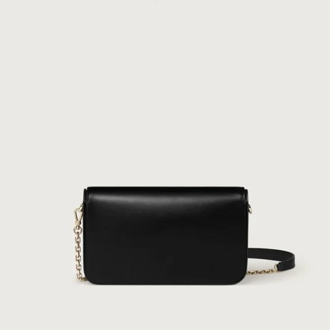 Mini-Kettenhandtasche, Double C de Cartier – Schwarzes Kalbsleder, Gold- und Schwarz-Emaille-Finish – Cartier