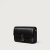 Mini-Kettenhandtasche, Double C de Cartier – Schwarzes Kalbsleder, Gold- und Schwarz-Emaille-Finish – Cartier