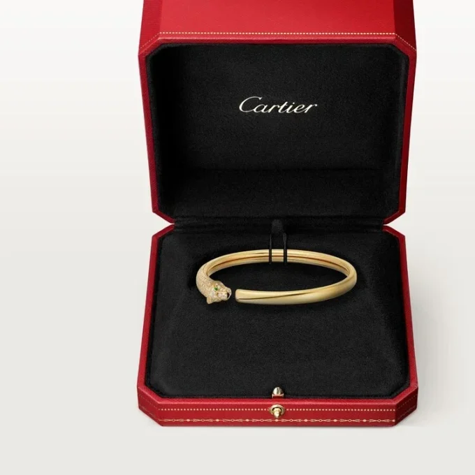 Panthere de Cartier Armband, kleines Modell, halb mit Diamanten besetzt
