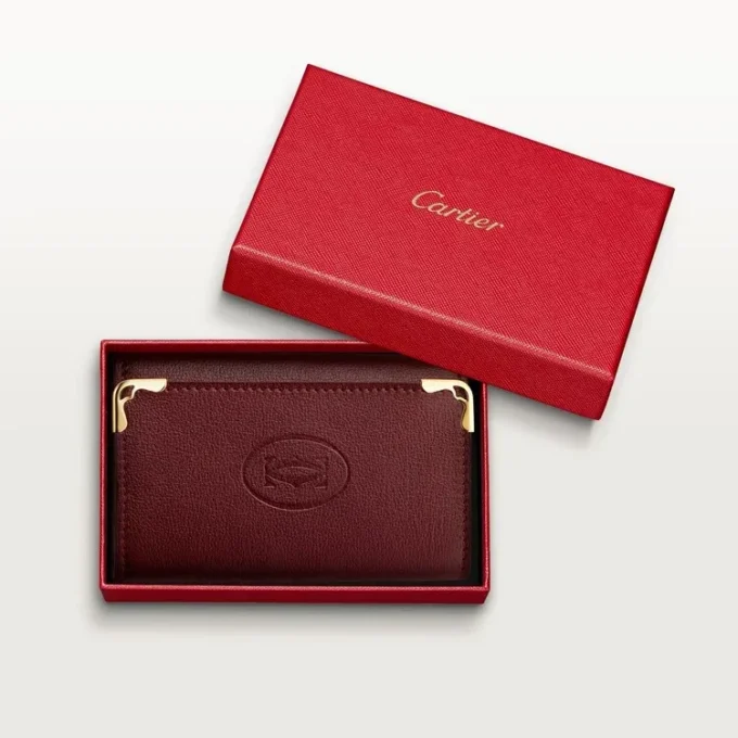 Schlüsselanhänger für 6 Schlüssel, Must de Cartier – burgunderrotes Kalbsleder, goldene Oberfläche – Cartier